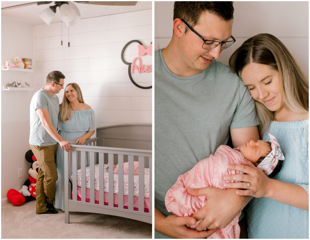 New mom and dad holding their baby girl in her minnie mouse themed nursery while looking at their infant girl by northeast Ohio newborn photographer, Brittany Serowski Photography